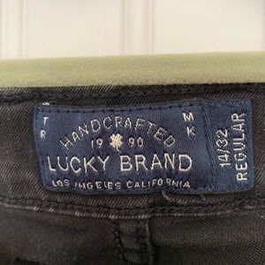 Weathered black denim jeans